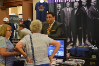 Chris Jenkins, of The Kingsmen, talks with some fans.